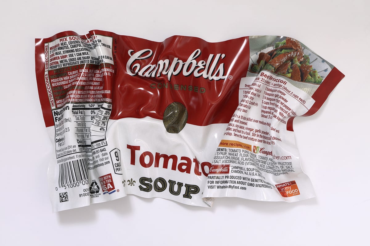 A flying Tomato Soup wrapper