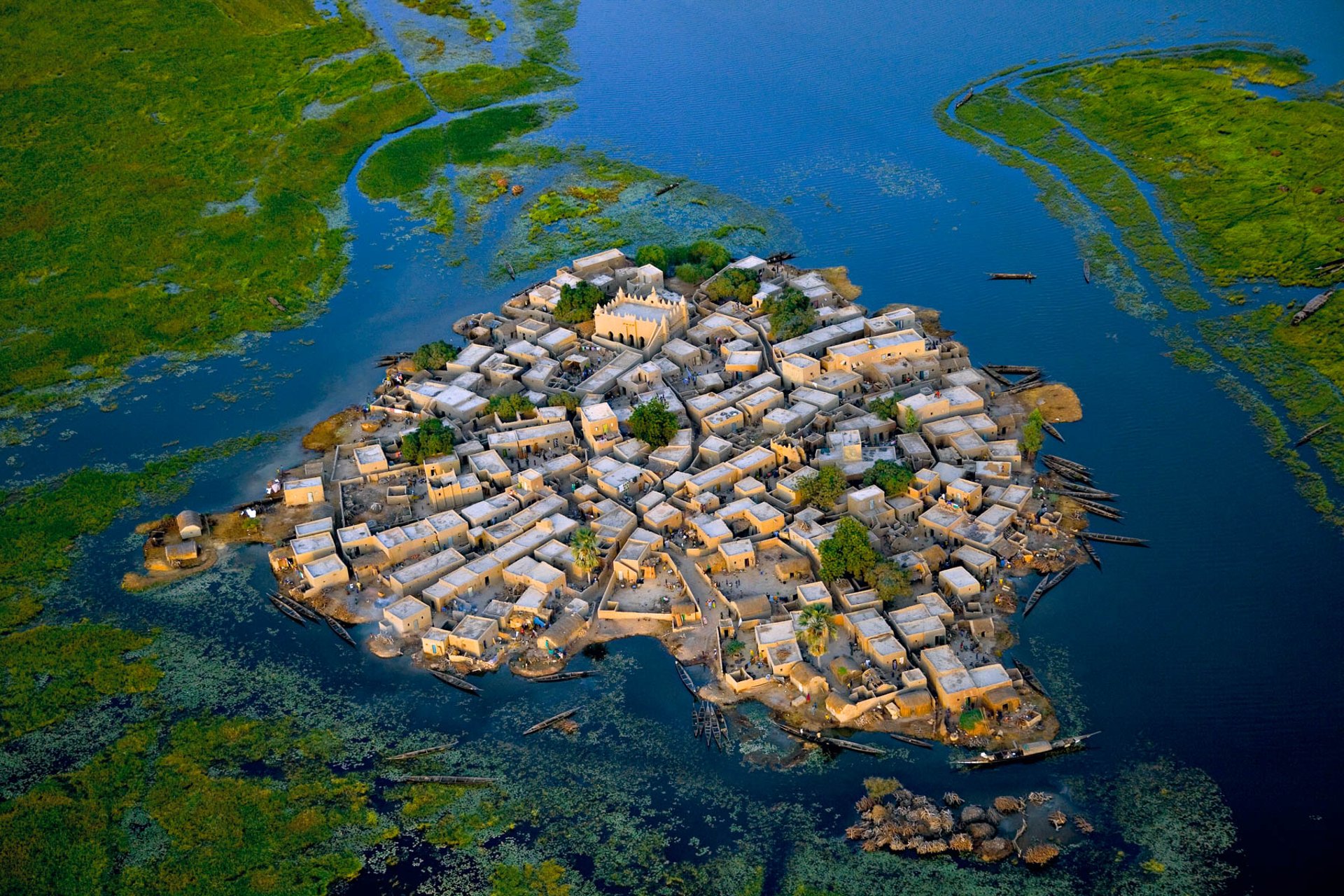 YANN ARTHUS-BERTRAND, Village Surrounded by Water, South Sudan