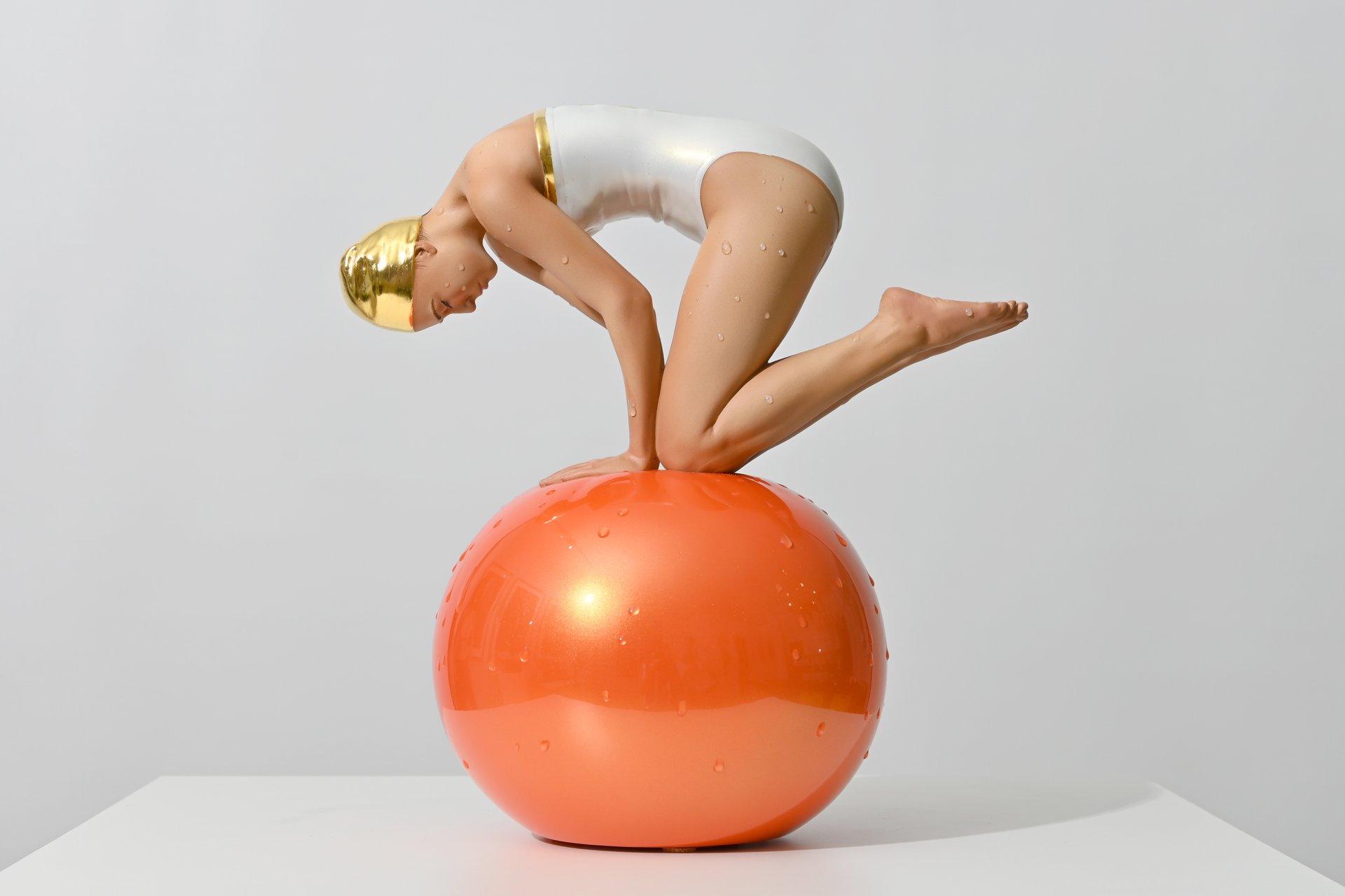 CAROLE FEUERMAN, Miniature Quan - Pearl White Suit w/ 24K Gold Leaf Cap, Accents & Tangerine Sphere - Oil on resin sculpture with 24K gold leaf